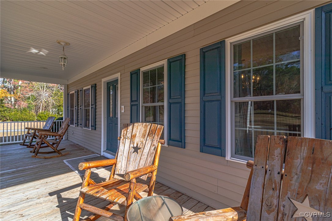 1843 Fairport Road Reedville, VA 22539 - Photo 15 of 43 Wooden deck with covered porch