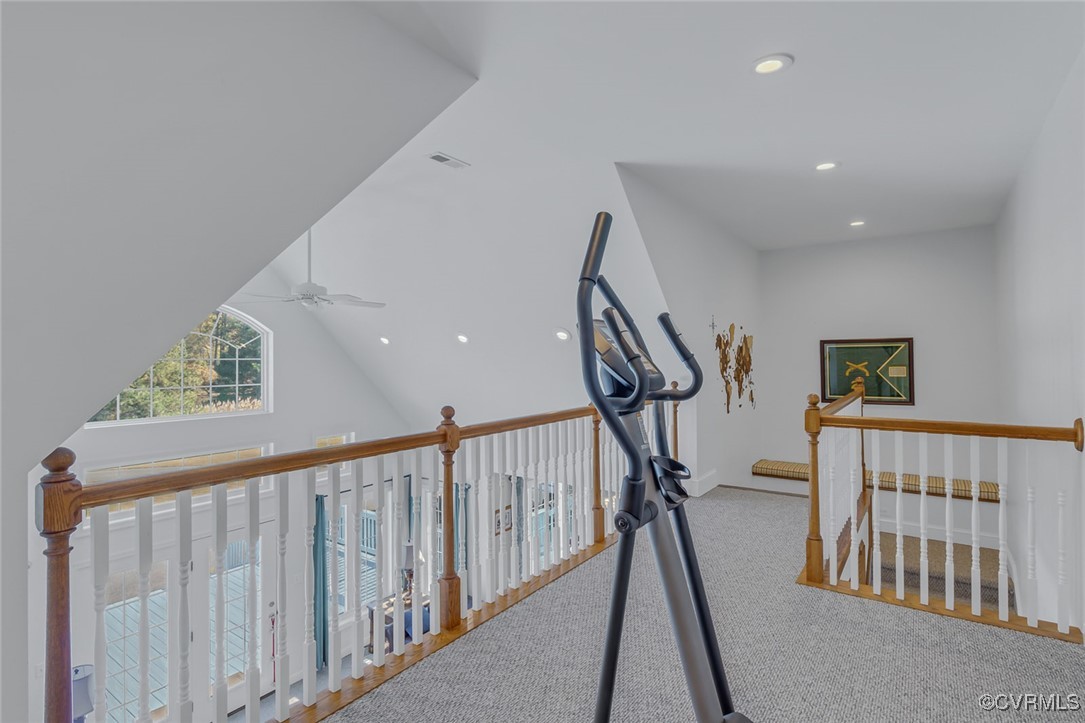 1843 Fairport Road Reedville, VA 22539 - Photo 35 of 43 Hall with carpet flooring and vaulted ceiling