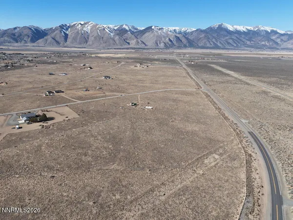 a view of a room with a bed