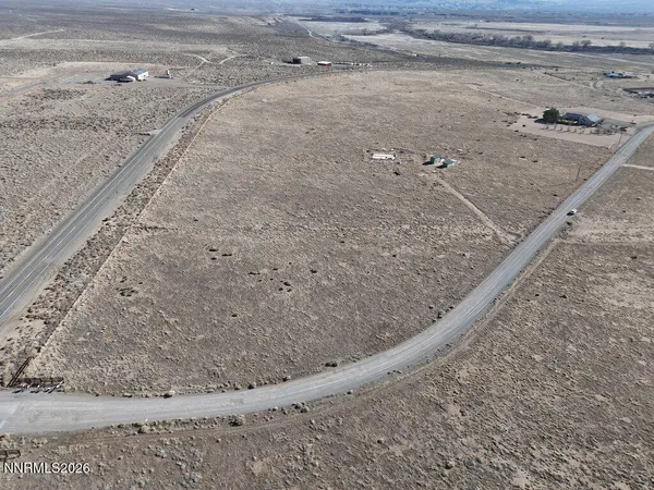 a view of a dry yard in the road
