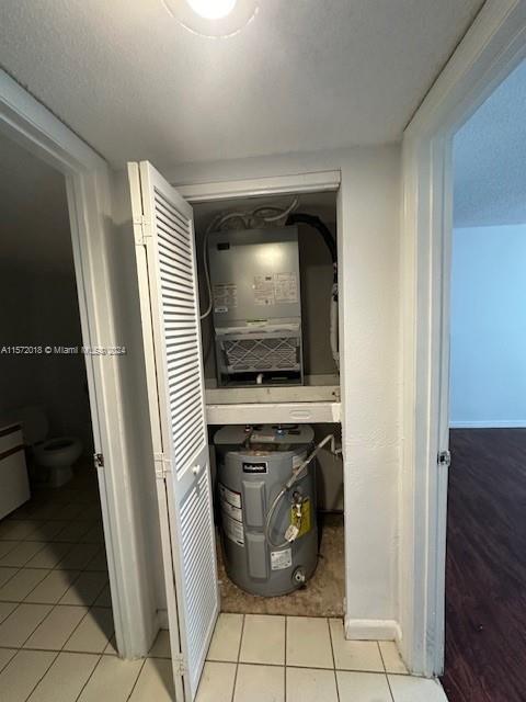 3985 West McNab Road, Unit A111 Pompano Beach, FL 33069 - Photo 31 of 36 a kitchen with a stove and a microwave