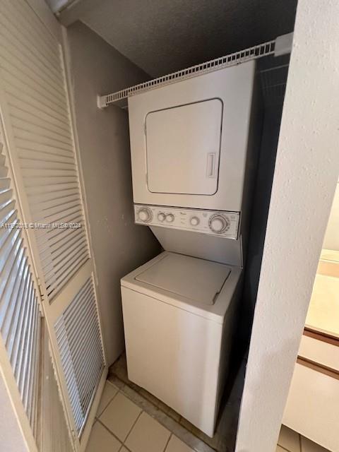 3985 West McNab Road, Unit A111 Pompano Beach, FL 33069 - Photo 5 of 36 a utility room with dryer and washer