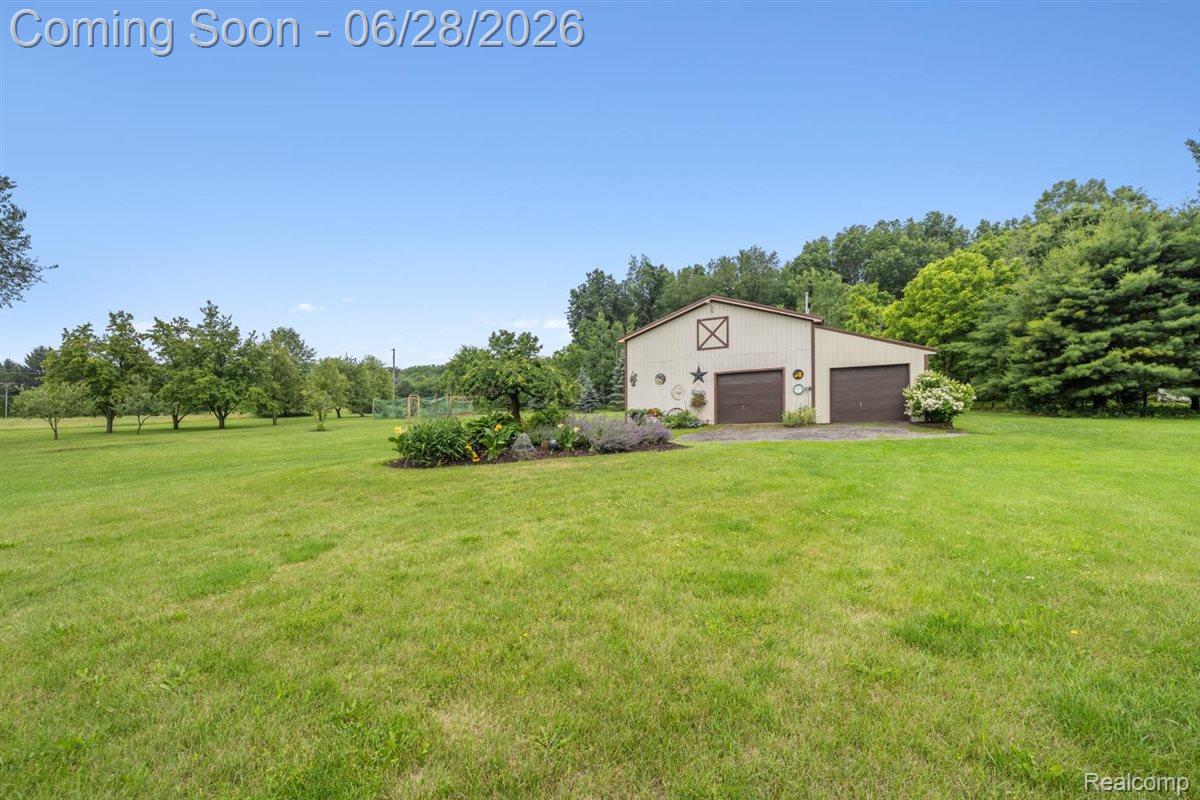 125 Olde Franklin Road Howell, MI 48855 - Photo 5 of 57 Outbulding with lean-to