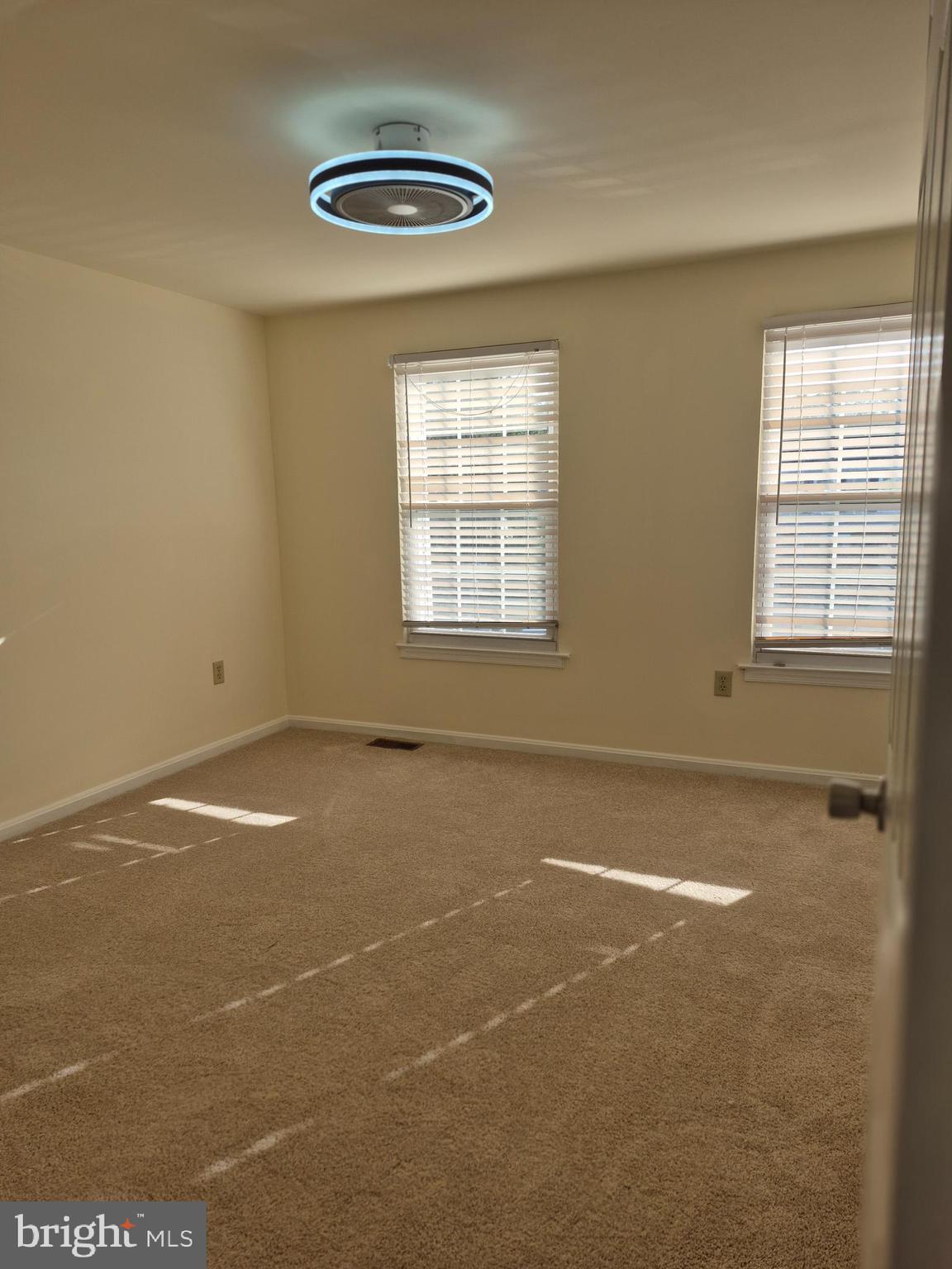 520 Bend Circle Road Glen Burnie, MD 21061 - Photo 13 of 23 an empty room with a empty space and a window
