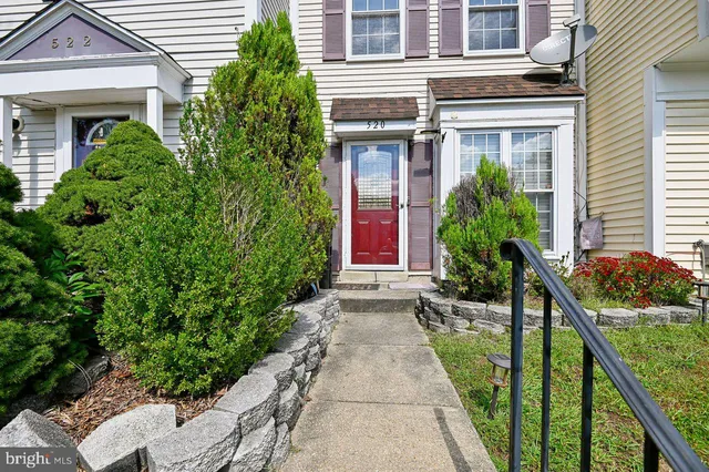 a house view with a garden space