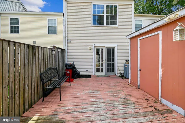 a view of a wooden door and a outdoor space