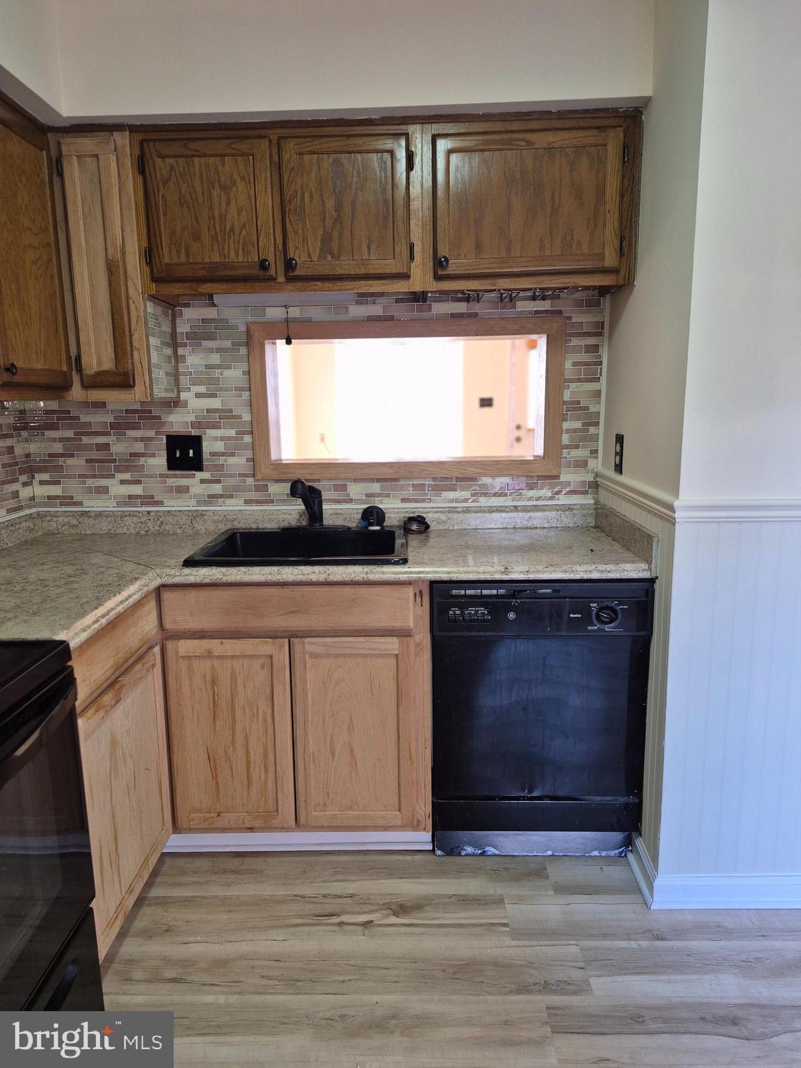 520 Bend Circle Road Glen Burnie, MD 21061 - Photo 8 of 23 a stove top oven sitting inside of a kitchen