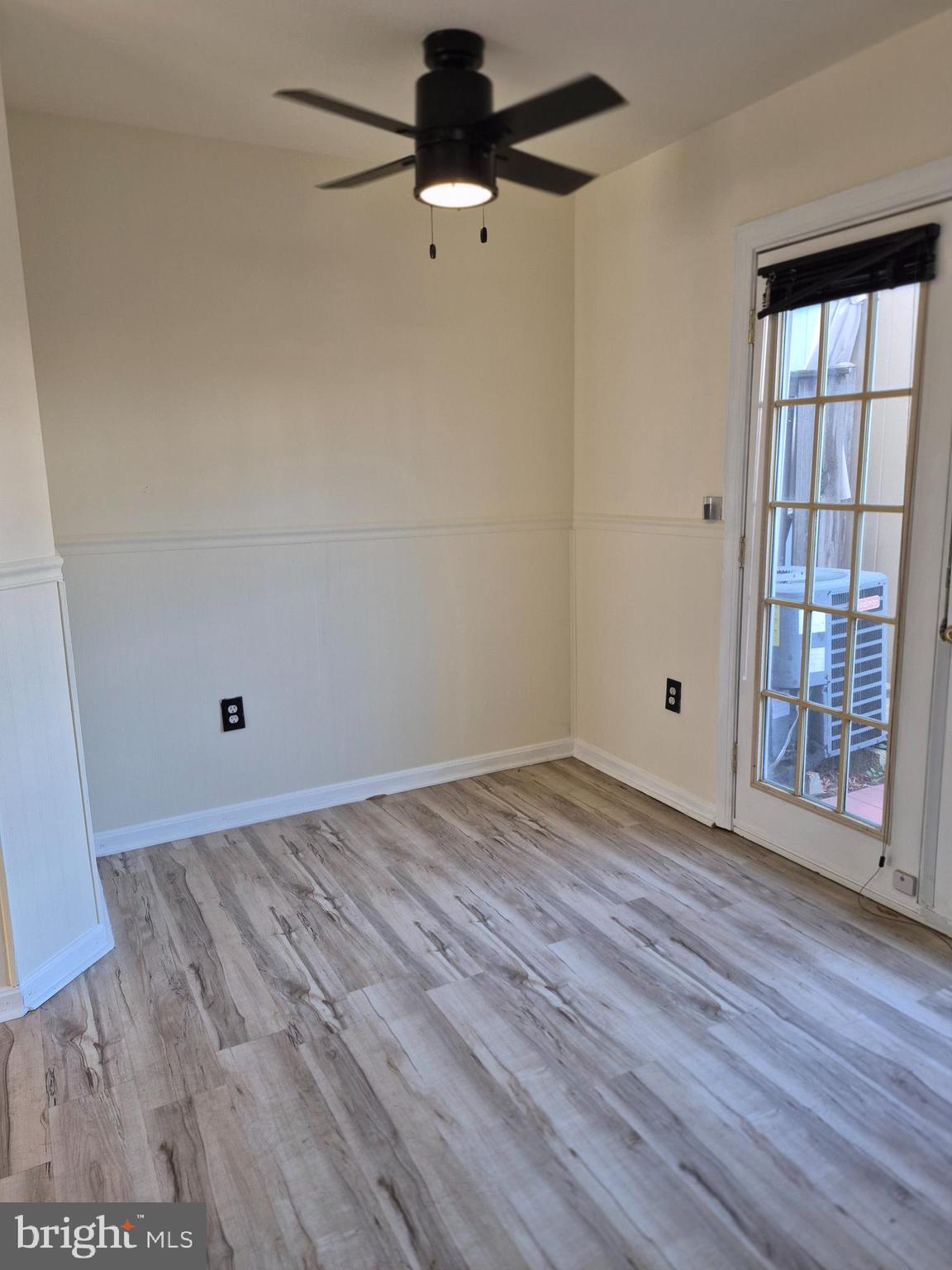520 Bend Circle Road Glen Burnie, MD 21061 - Photo 9 of 23 wooden floor in an empty room with a window