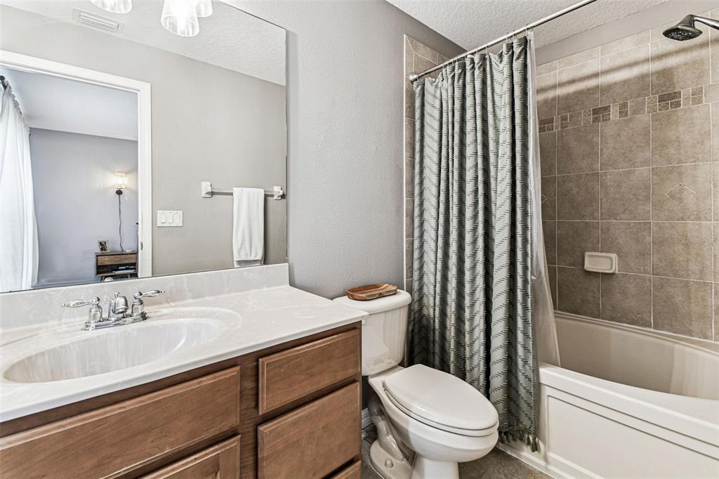 2503 Middleton Grove Drive Brandon, FL 33511 - Photo 20 of 39 a bathroom with a sink toilet and shower