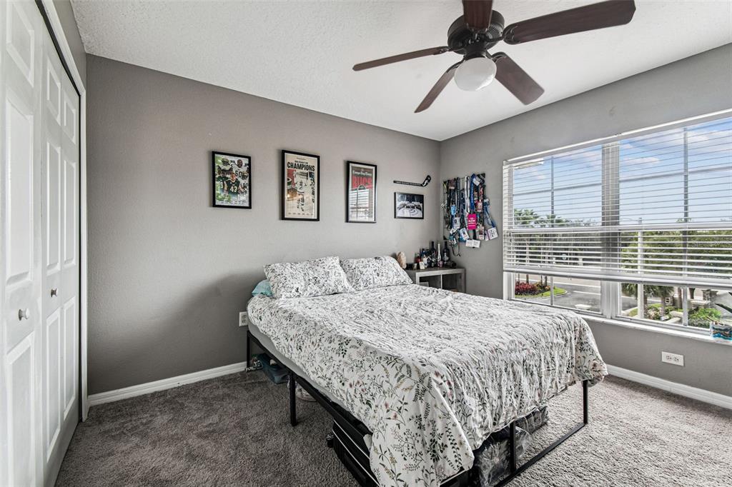 2503 Middleton Grove Drive Brandon, FL 33511 - Photo 23 of 39 a bedroom with bed and a window