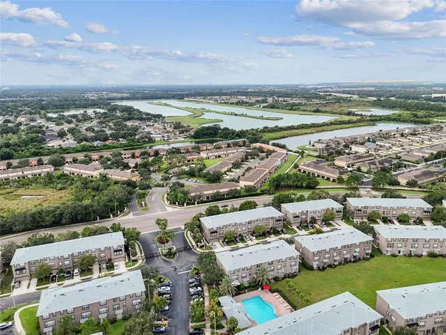 an aerial view of a city with lots of residential buildings