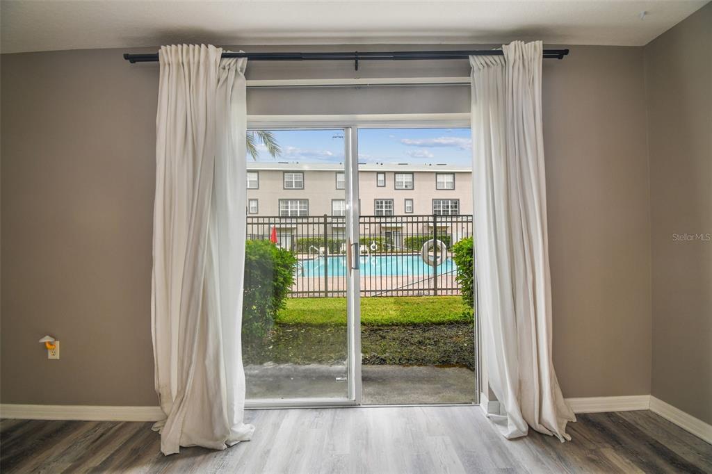 2503 Middleton Grove Drive Brandon, FL 33511 - Photo 38 of 39 a view of a room with wooden floor and windows