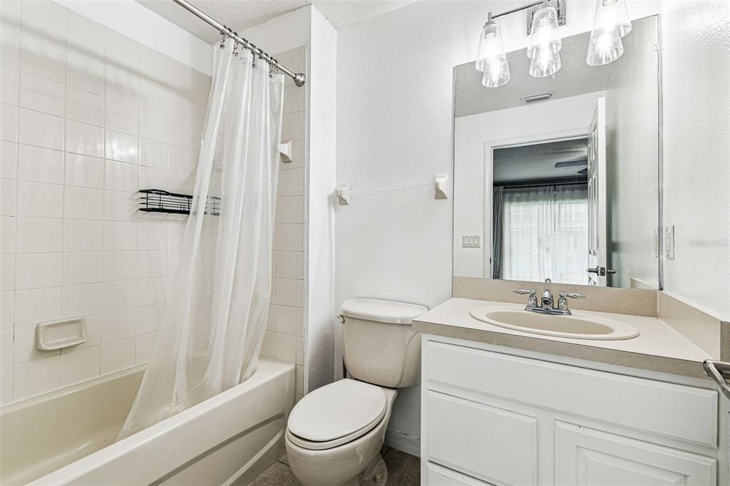 2503 Middleton Grove Drive Brandon, FL 33511 - Photo 5 of 39 a bathroom with a sink a toilet and shower