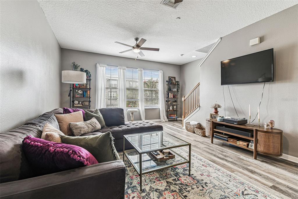 2503 Middleton Grove Drive Brandon, FL 33511 - Photo 8 of 39 a living room with furniture and a flat screen tv