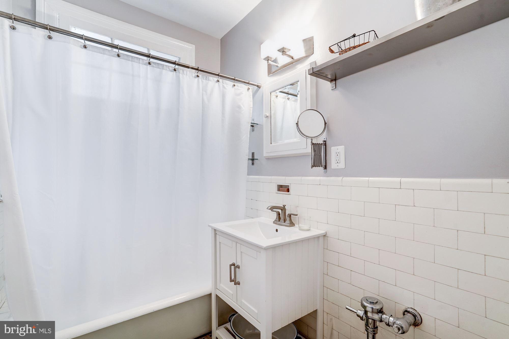 2707 Adams Mill Road Northwest, Unit 500 Washington, DC 20009 - Photo 24 of 52 Renovated bathroom