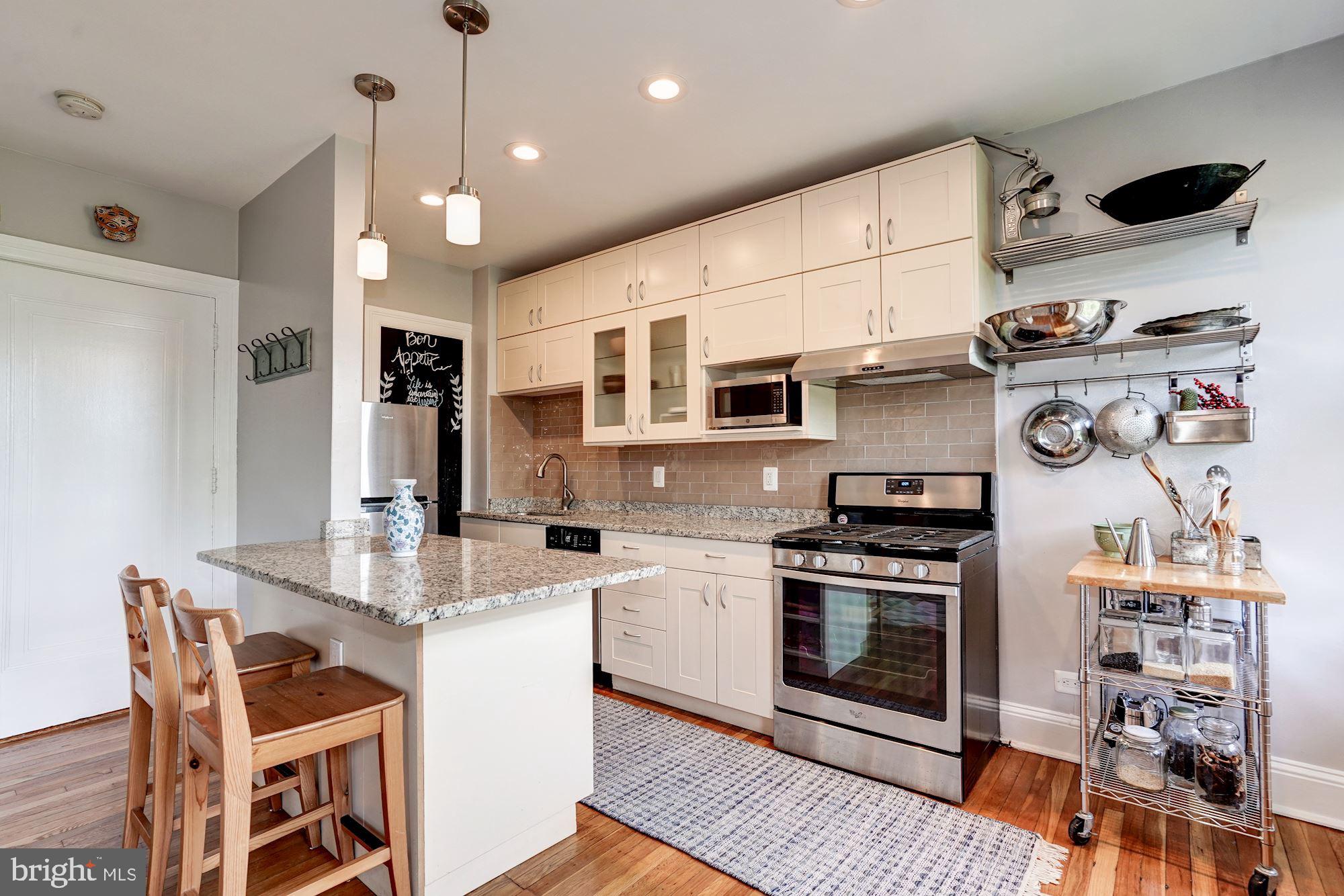 2707 Adams Mill Road Northwest, Unit 500 Washington, DC 20009 - Photo 8 of 52 Updated kitchen w/stainless steel appliances