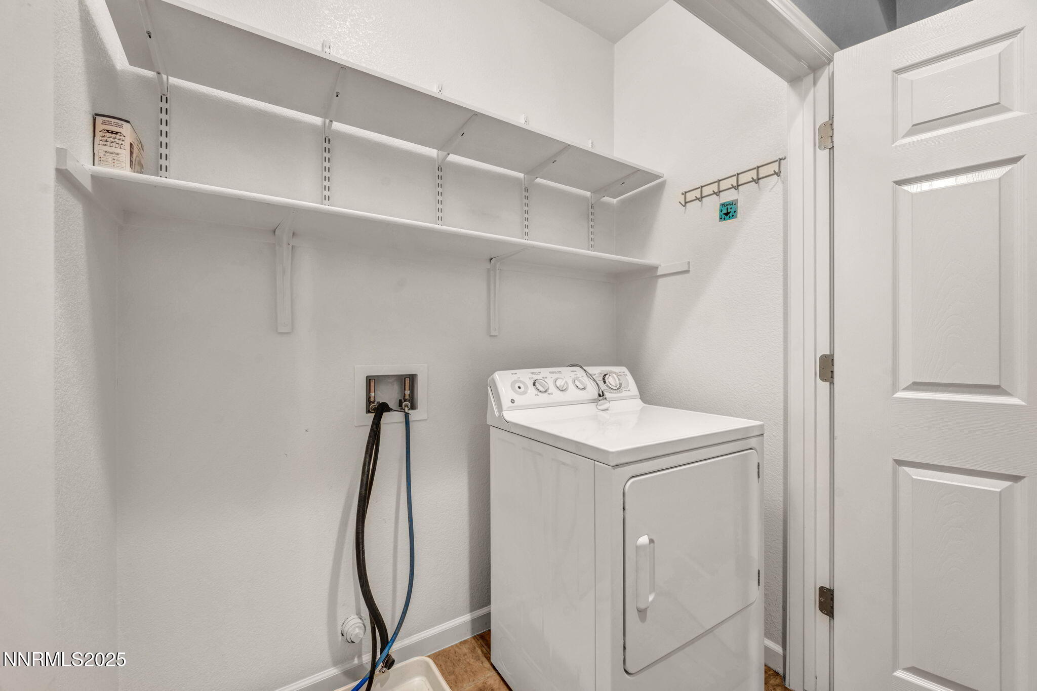 1864 Wind Ranch Road, Unit C Reno, NV 89521 - Photo 26 of 49 a room with storage and utility