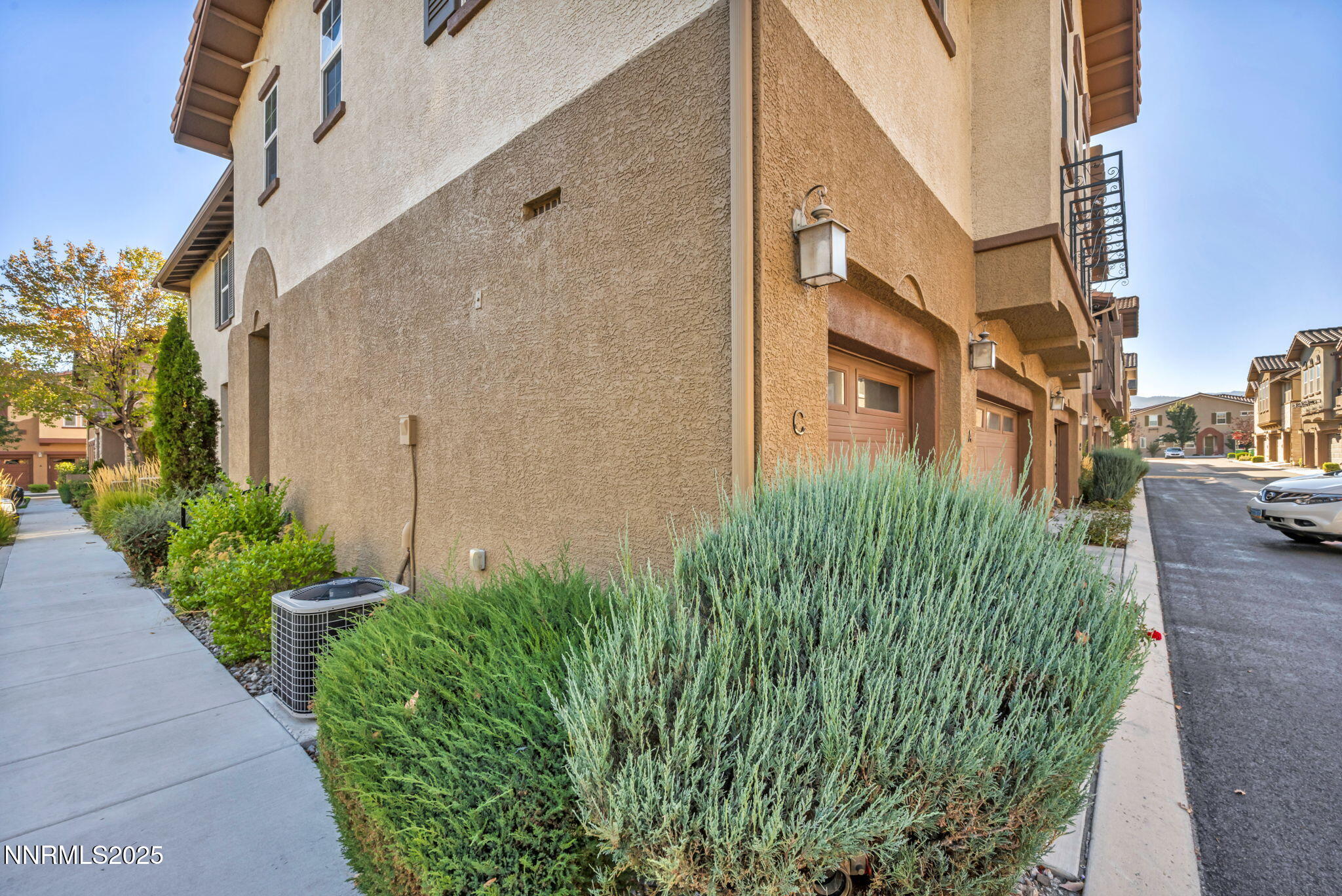 1864 Wind Ranch Road, Unit C Reno, NV 89521 - Photo 30 of 49 a view of a garden with pathway