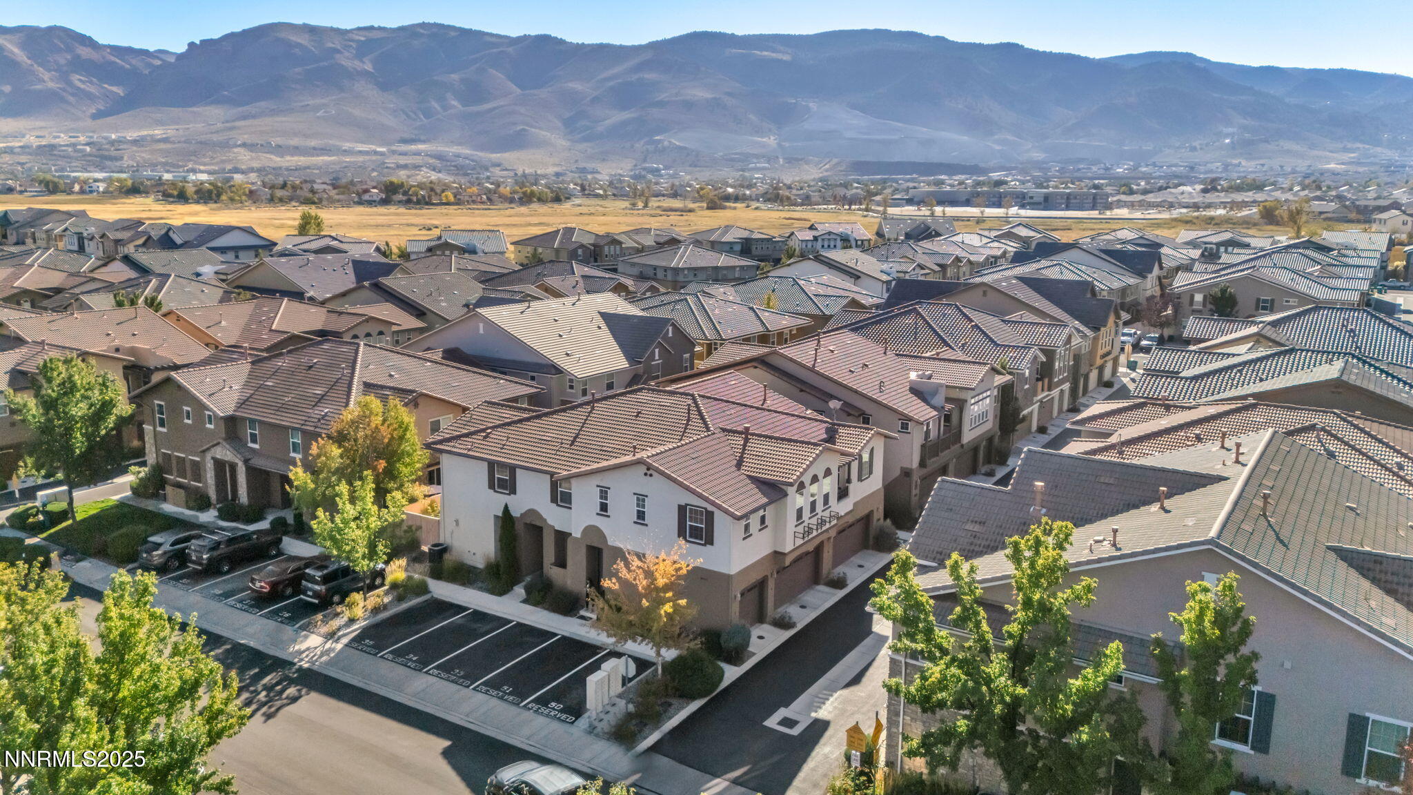1864 Wind Ranch Road, Unit C Reno, NV 89521 - Photo 40 of 49 a view of a city with a lake