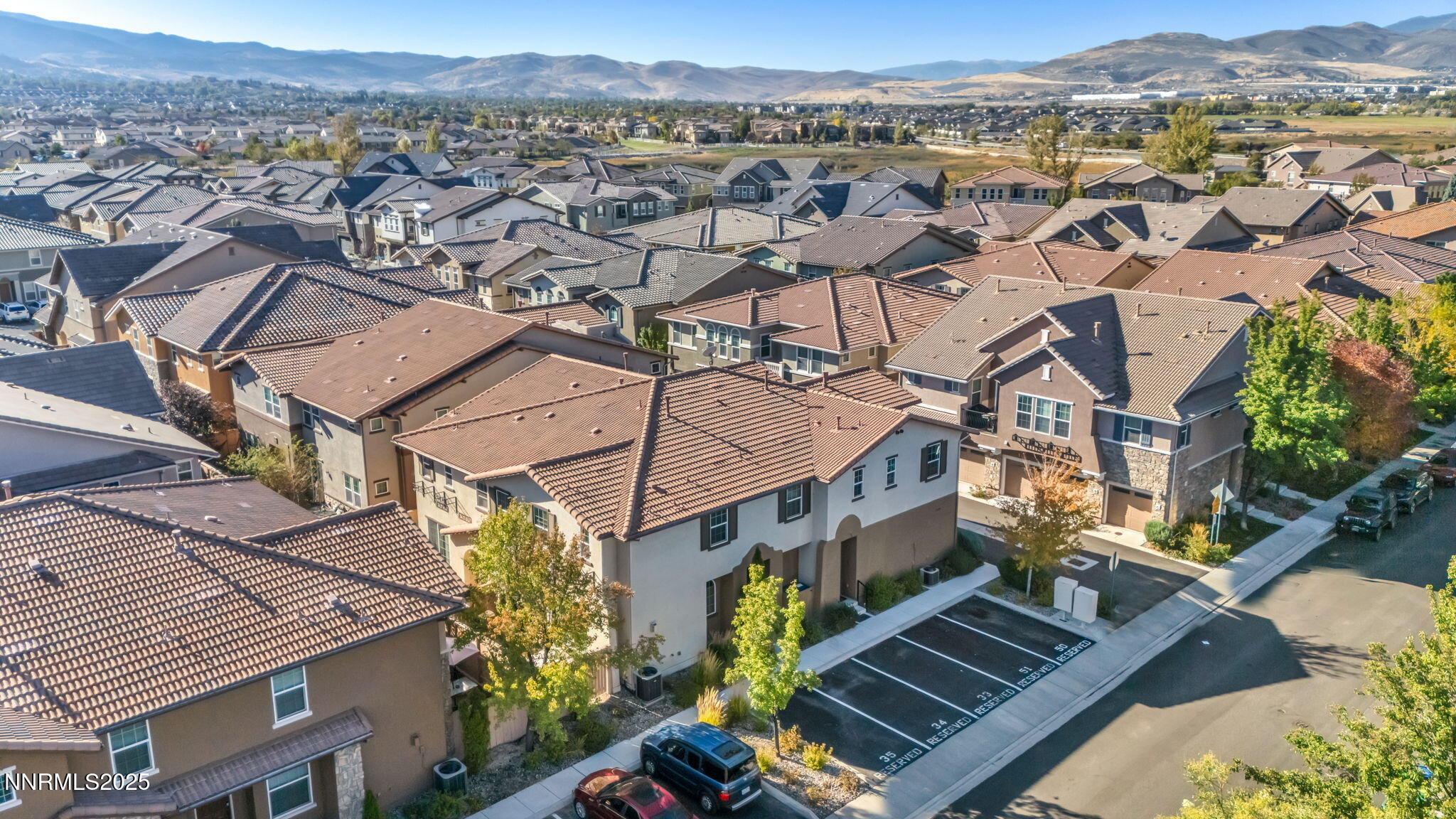 1864 Wind Ranch Road, Unit C Reno, NV 89521 - Photo 41 of 49 an aerial view of residential houses with outdoor space