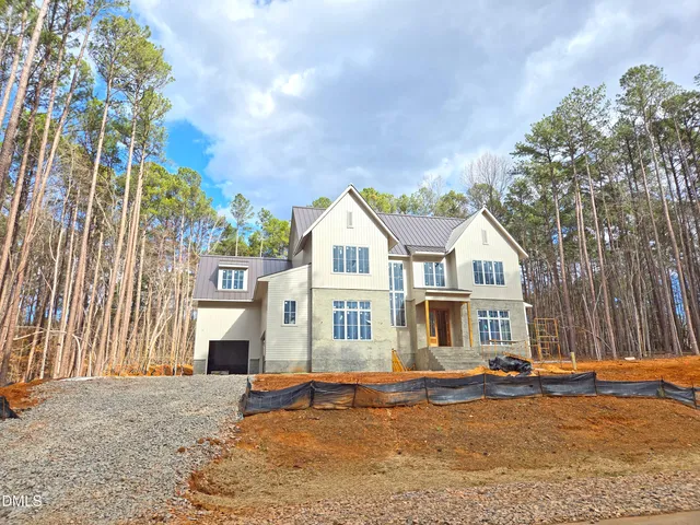 $3,475,000 | 6448 Sanctuary Falls Drive, Raleigh, NC 27614