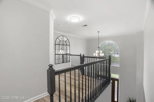 a bathroom with a granite countertop sink toilet a mirror and shower