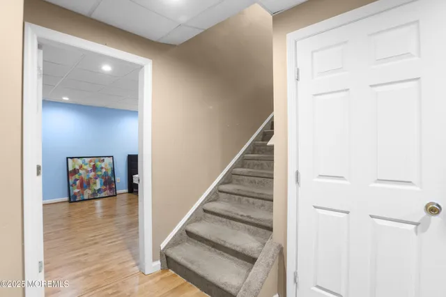 a view of a garden with a building in the background