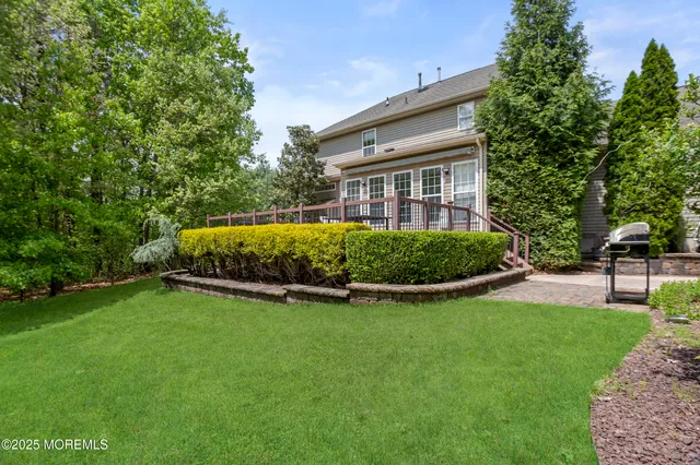 an aerial view of residential house with outdoor space and street view