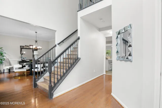 a kitchen with stainless steel appliances a sink stove and cabinets