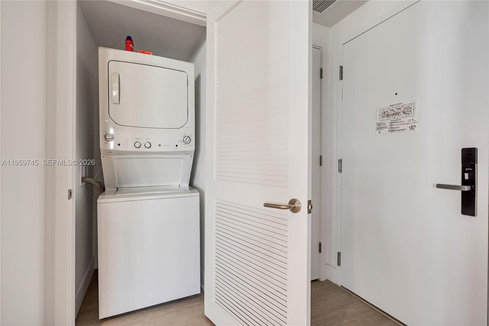 4010 South Ocean Drive, Unit R2301 Hollywood, FL 33019 - Photo 25 of 33 a utility room with dryer and washer