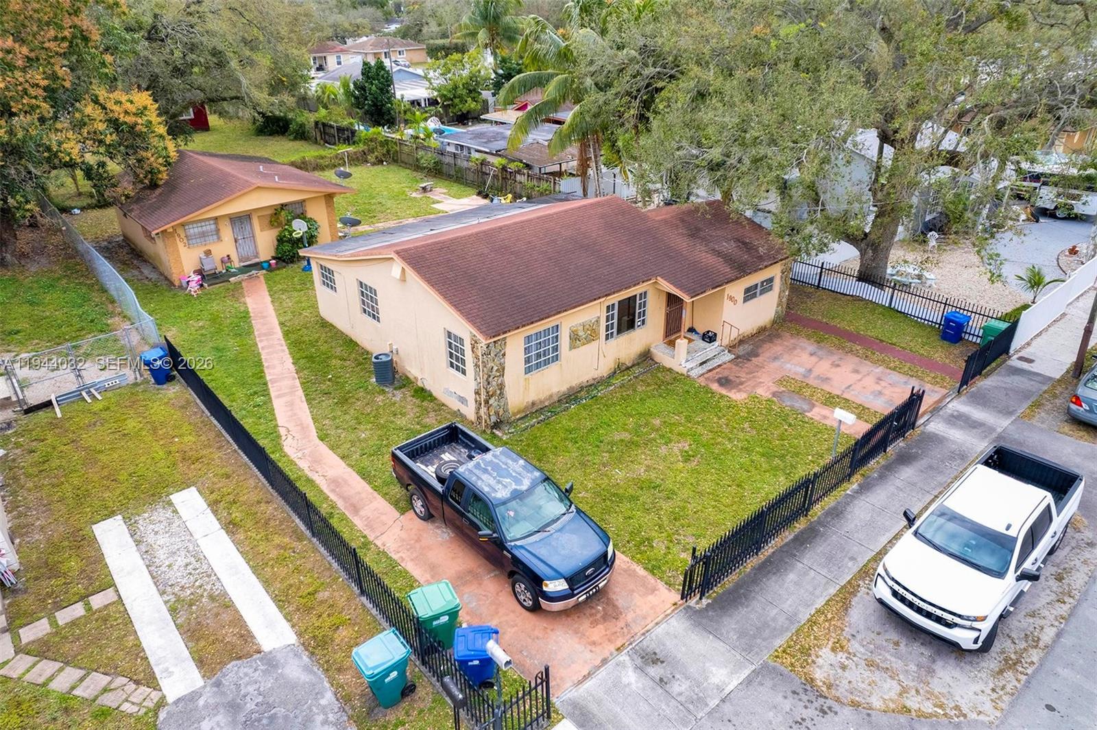 1900 Northwest 88th Street Miami, FL 33147 - Photo 24 of 31 an aerial view of a house with swimming pool
