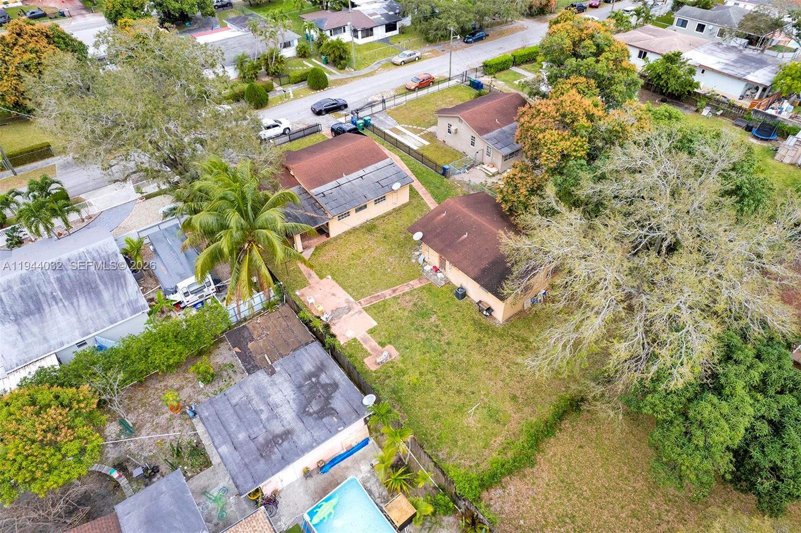 1900 Northwest 88th Street Miami, FL 33147 - Photo 25 of 31 an aerial view of a house with a yard