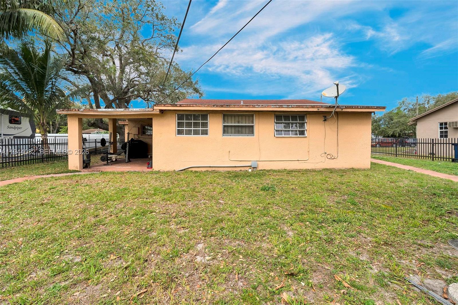 1900 Northwest 88th Street Miami, FL 33147 - Photo 30 of 31 a view of a house with a yard