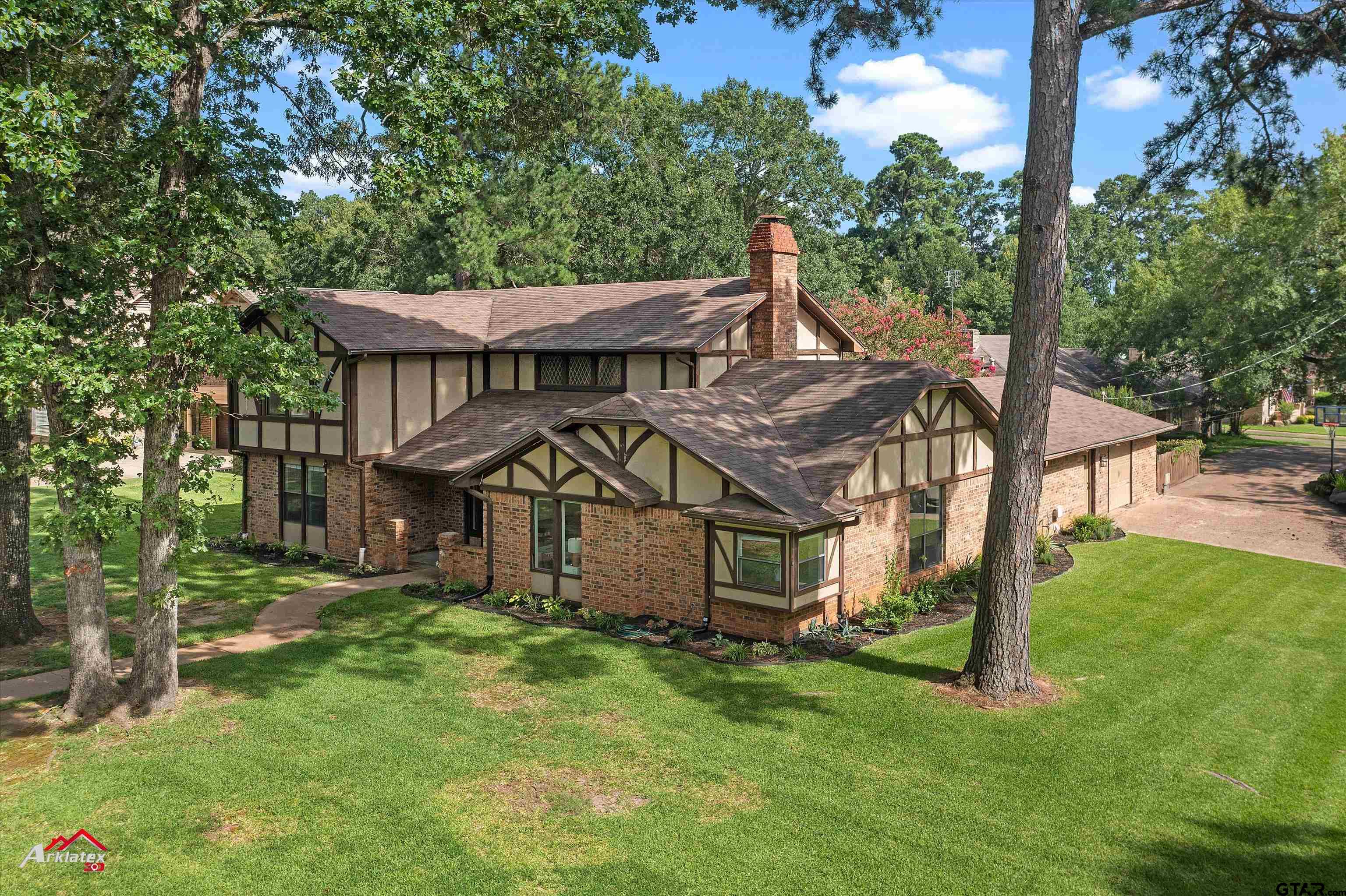 914 Regency Drive Longview, TX 75604 - Photo 1 of 35 front view of a house with a yard