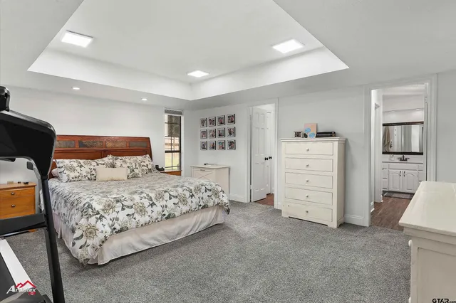 a bedroom with a bed and furniture