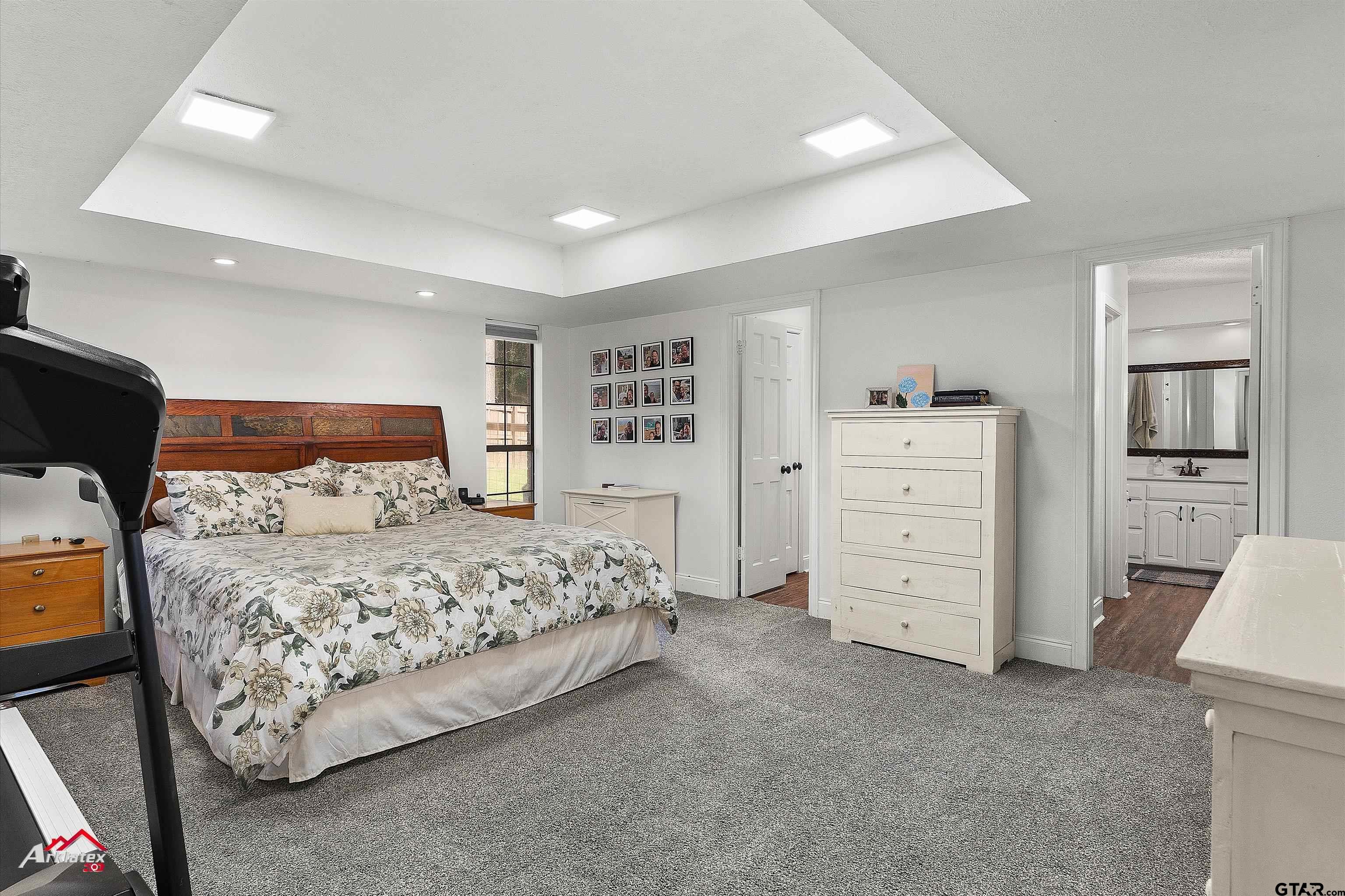 914 Regency Drive Longview, TX 75604 - Photo 11 of 35 a bedroom with a bed and furniture