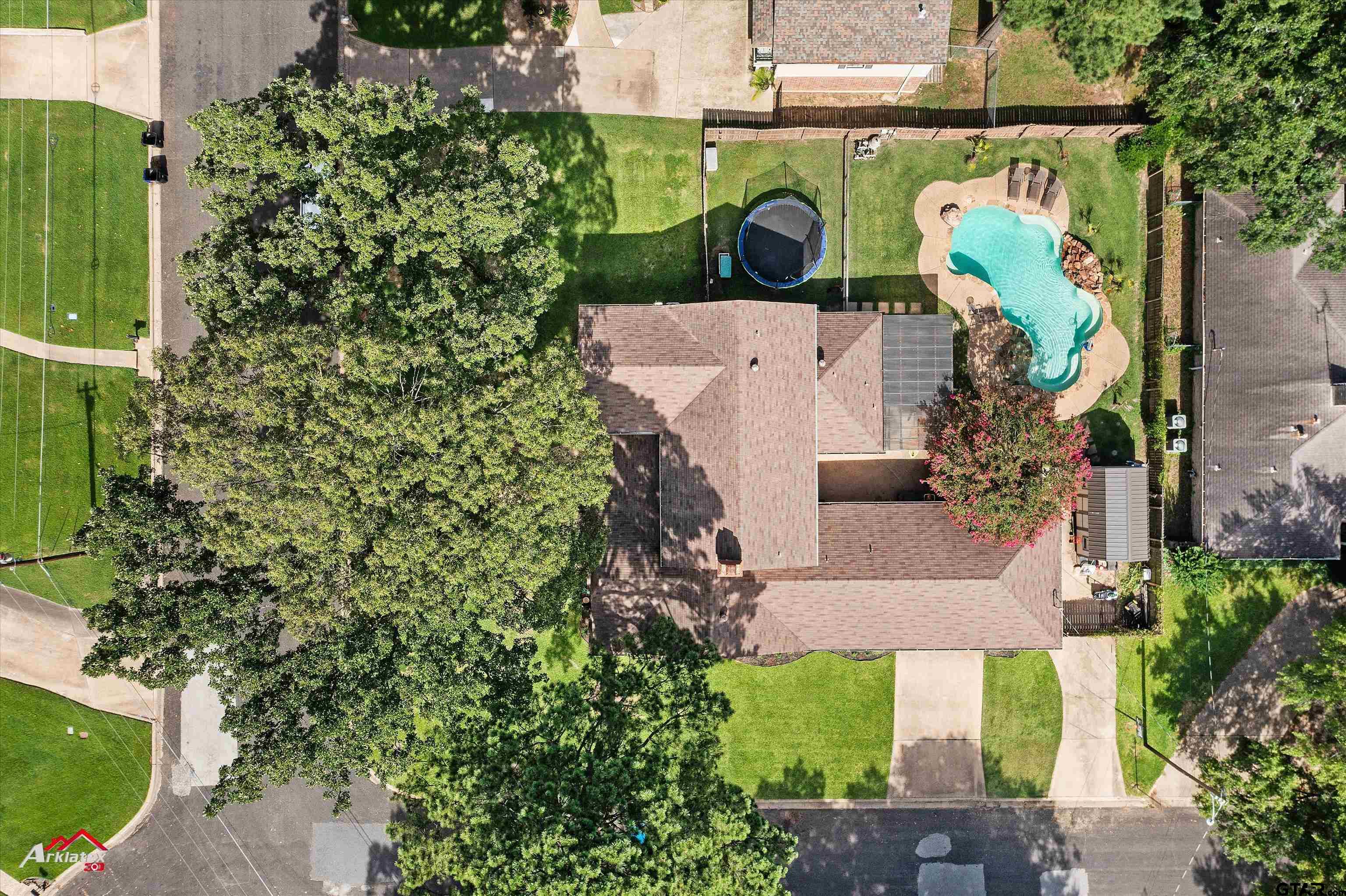 914 Regency Drive Longview, TX 75604 - Photo 2 of 35 an aerial view of a house with a garden