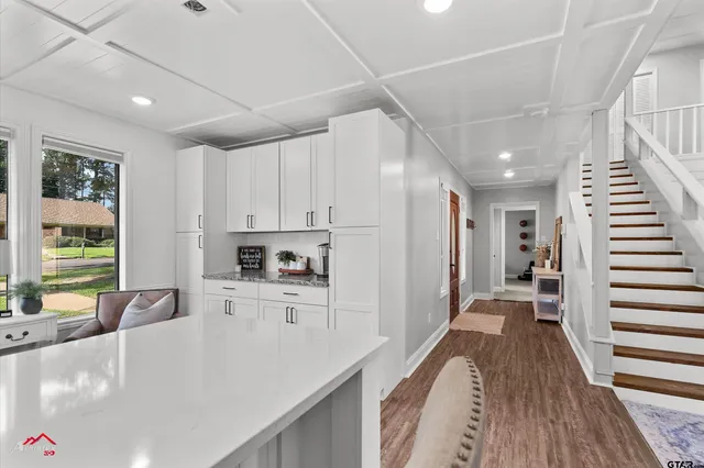 a view of a backyard with a garden and plants