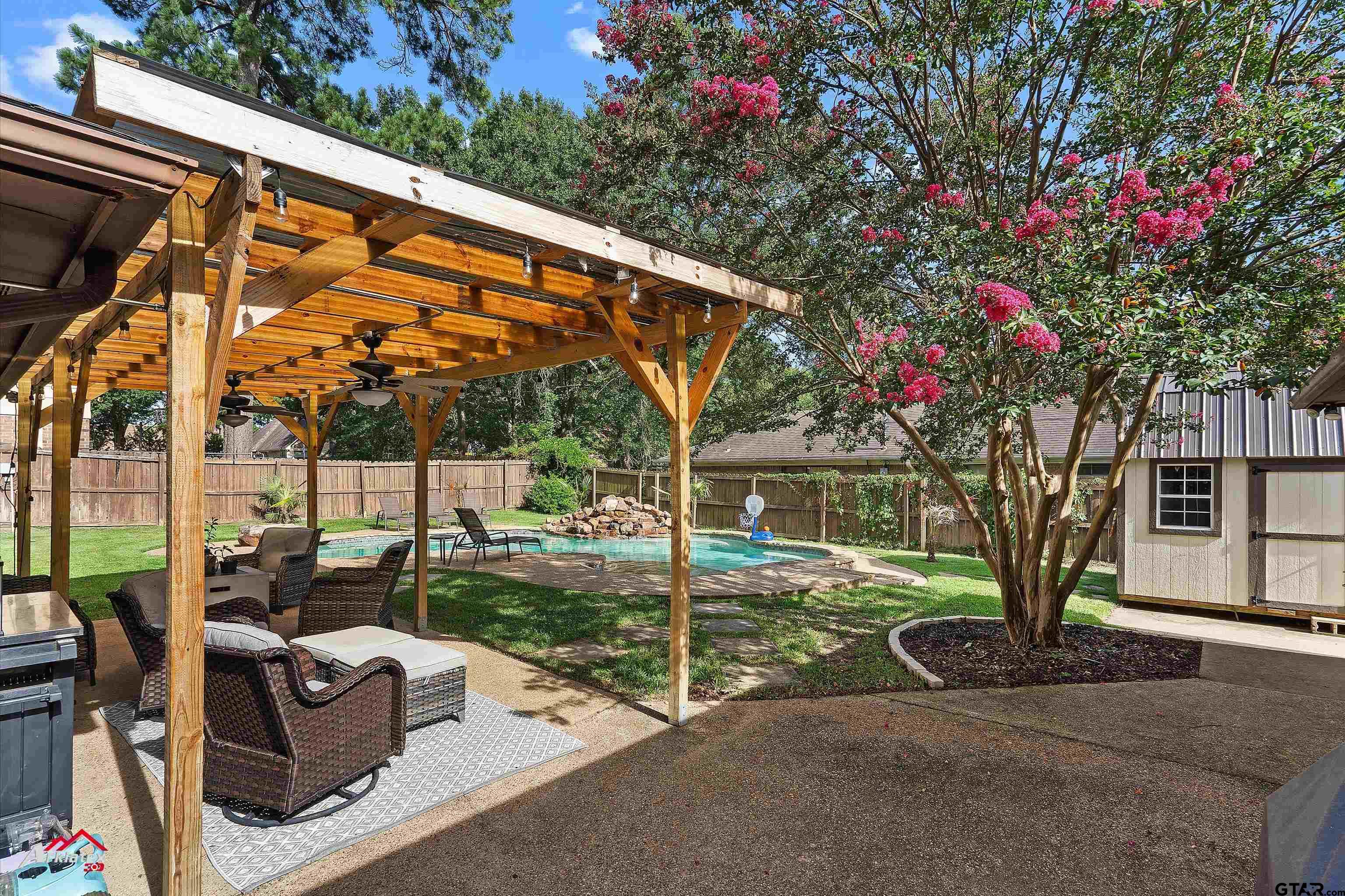 914 Regency Drive Longview, TX 75604 - Photo 31 of 35 a backyard of a house with seating space