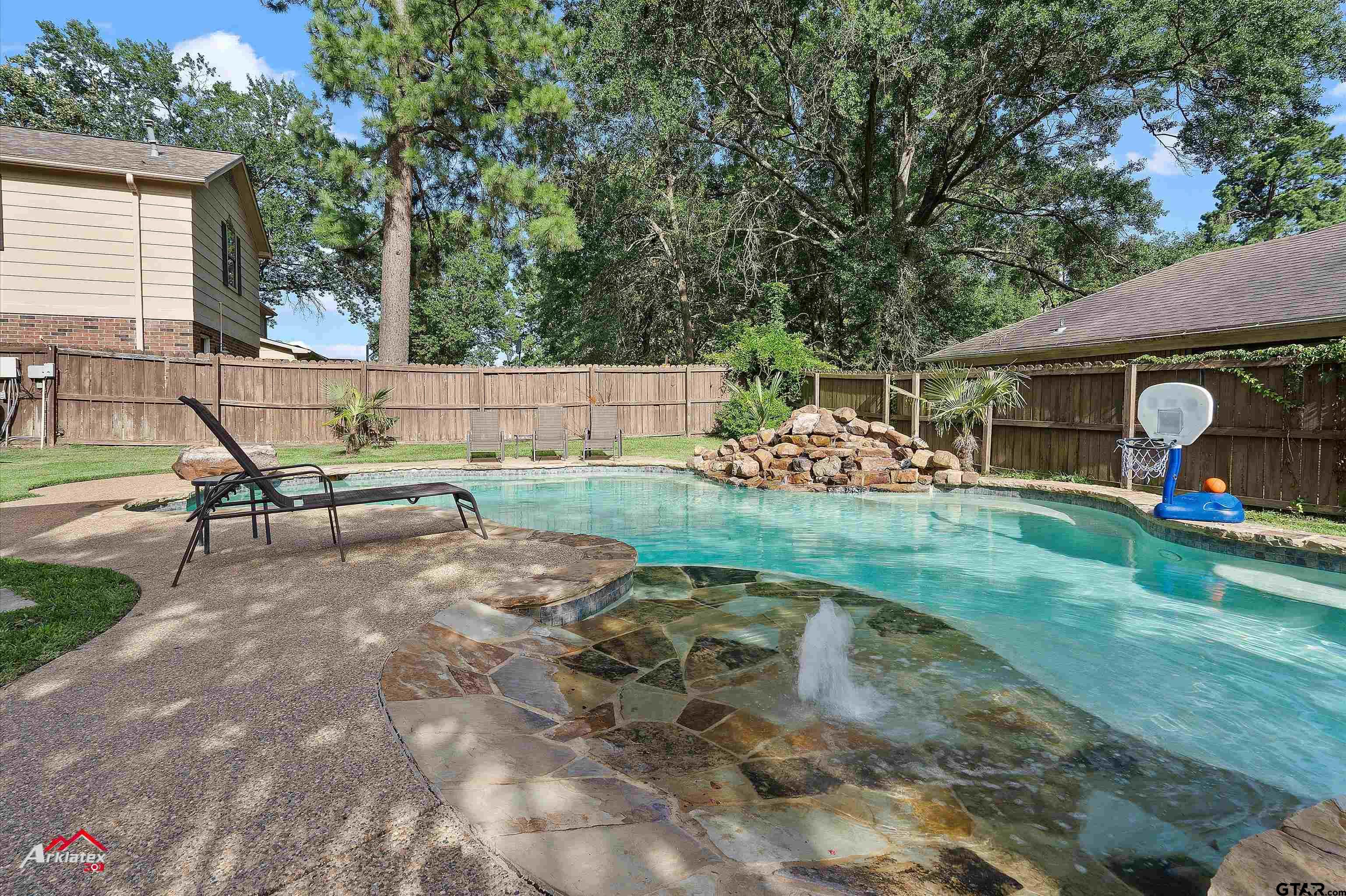 914 Regency Drive Longview, TX 75604 - Photo 34 of 35 a view of backyard with deck and garden