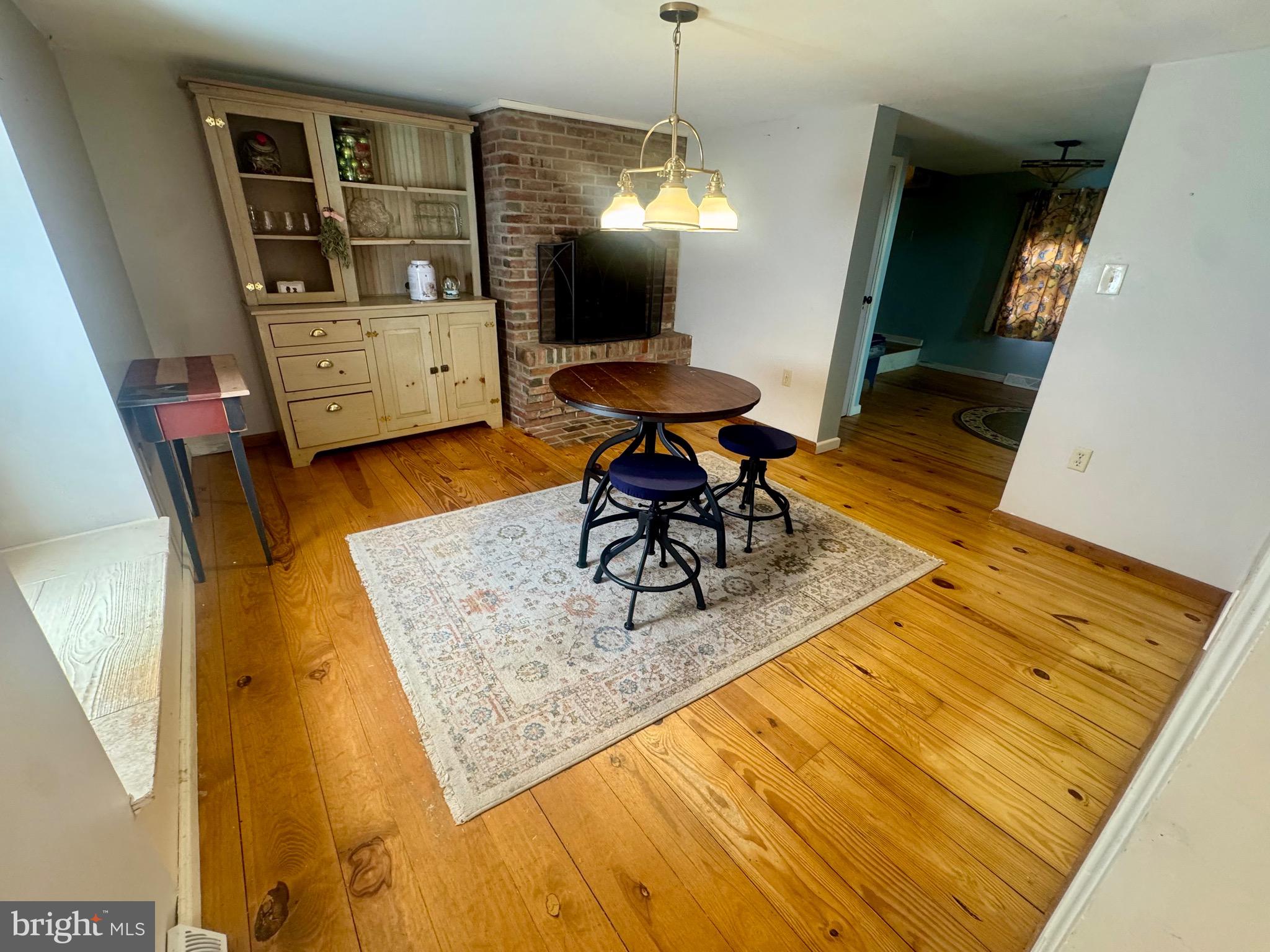 18 Market Street Salem, NJ 08079 - Photo 11 of 39 a living room with furniture and a couch