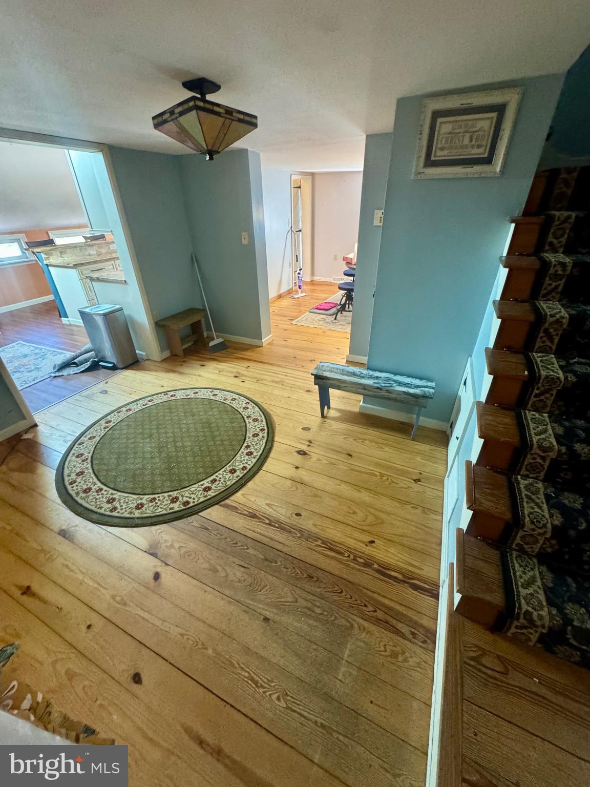 18 Market Street Salem, NJ 08079 - Photo 23 of 39 a view of a livingroom with furniture and staircase