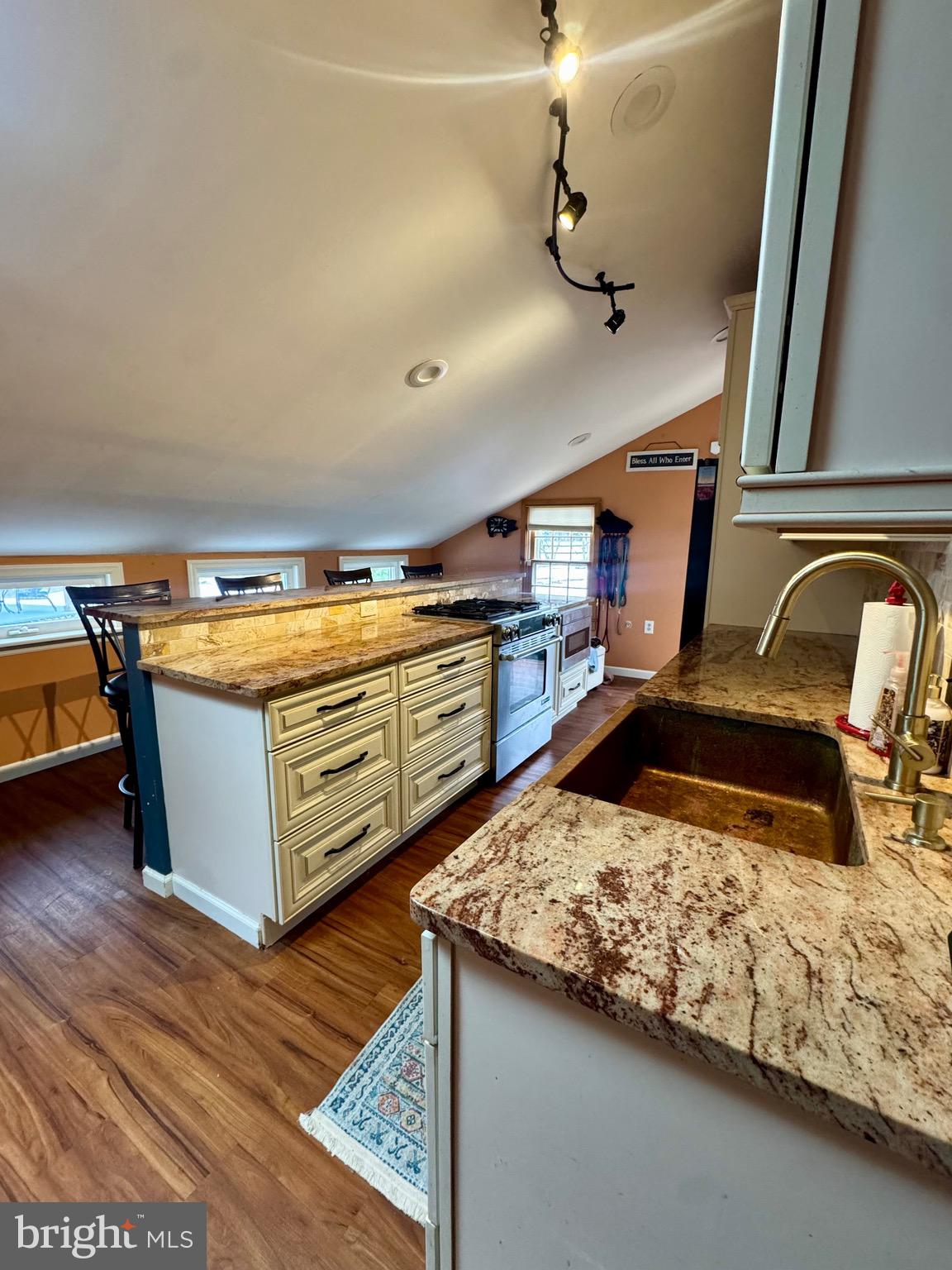 18 Market Street Salem, NJ 08079 - Photo 4 of 39 a bedroom with a bed and wooden floor