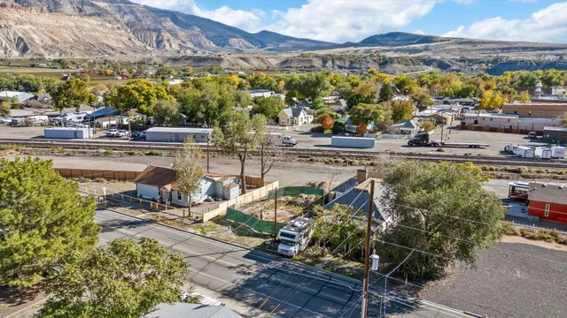 a view of a chairs and table in a patio