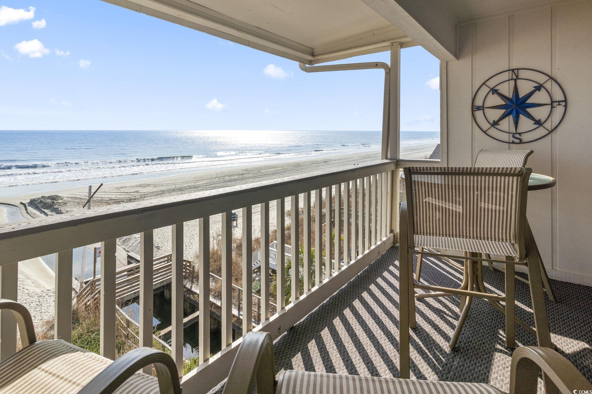 1111 North Ocean Boulevard, Unit 305 Surfside Beach, SC 29575 - Photo 29 of 38 Covered balcony