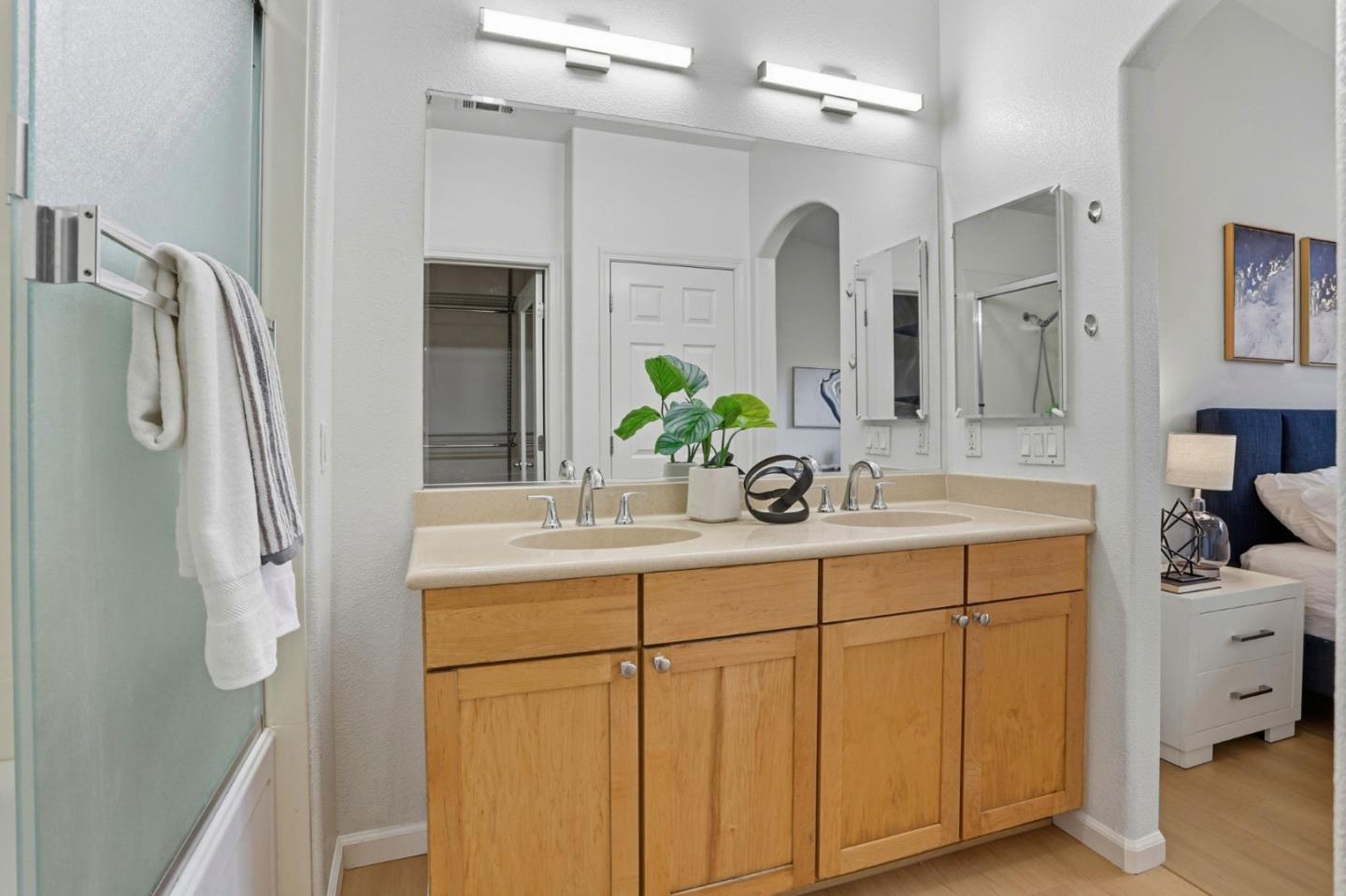 745 Mente Linda Loop Milpitas, CA 95035 - Photo 16 of 33 a bathroom with a double vanity sink mirror and shower
