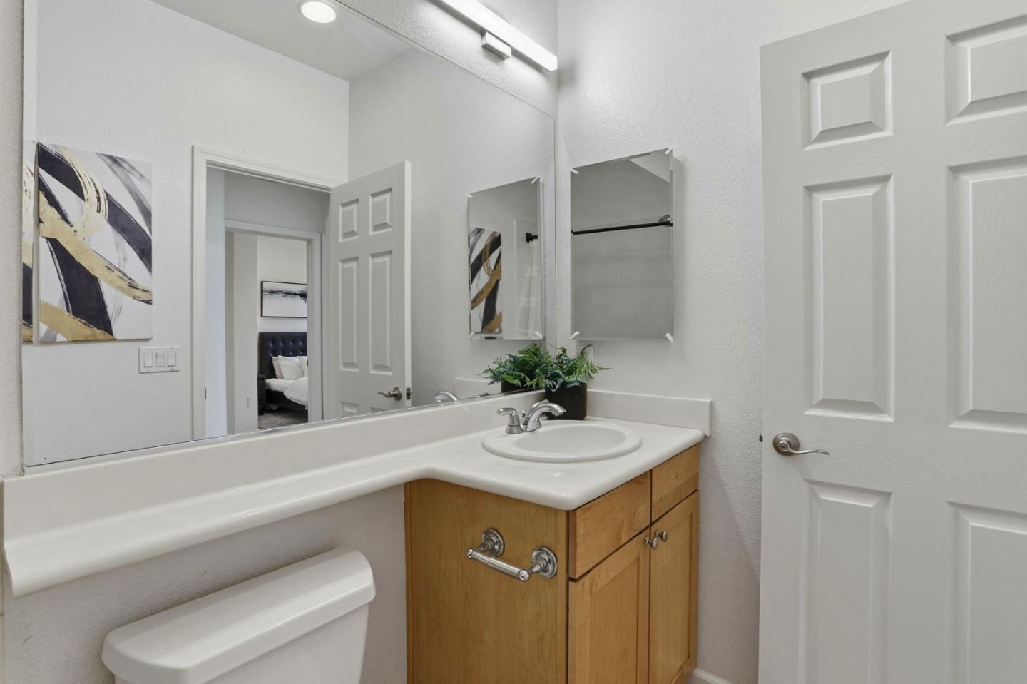 745 Mente Linda Loop Milpitas, CA 95035 - Photo 22 of 33 a bathroom with a sink and a mirror