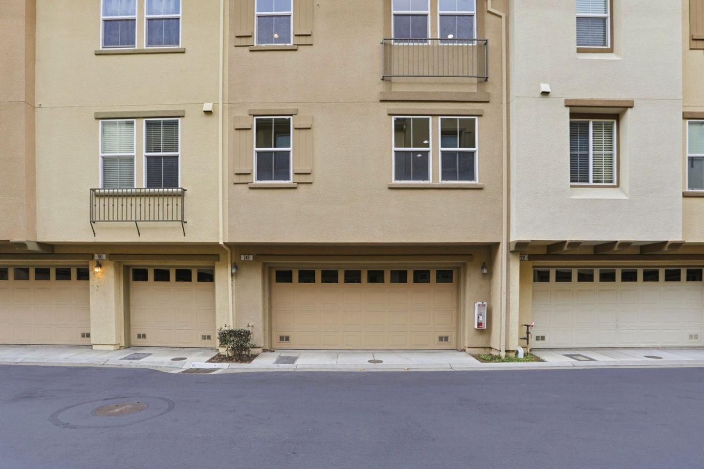745 Mente Linda Loop Milpitas, CA 95035 - Photo 26 of 33 a front view of a building with a street