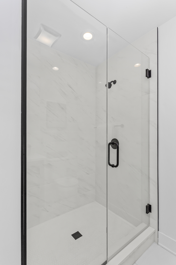 1453 Maple Avenue, Unit 102 Evanston, IL 60201 - Photo 9 of 21 a bathroom with a shower