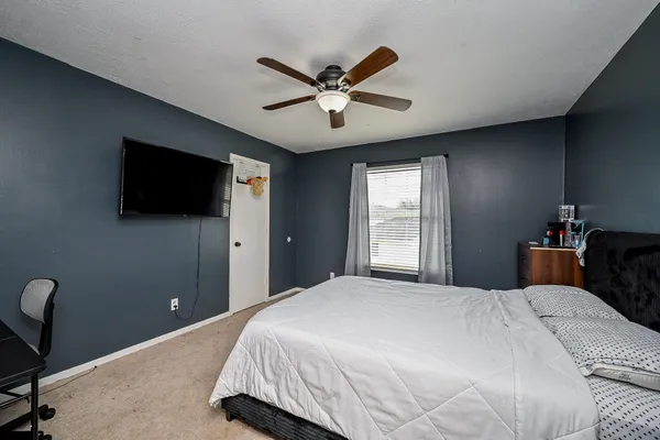 a view of a livingroom with a flat screen tv